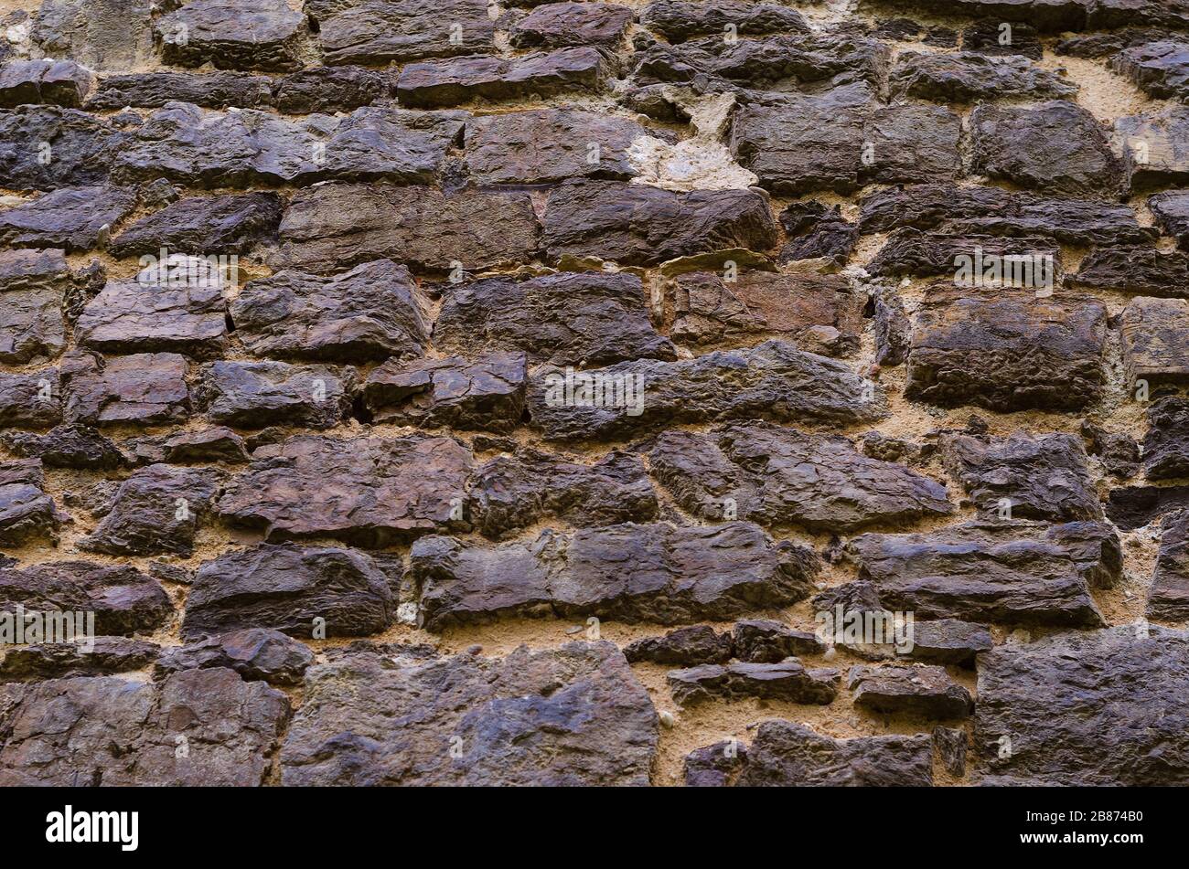 Steine in die Wand eingeklappt 6 Stockfoto