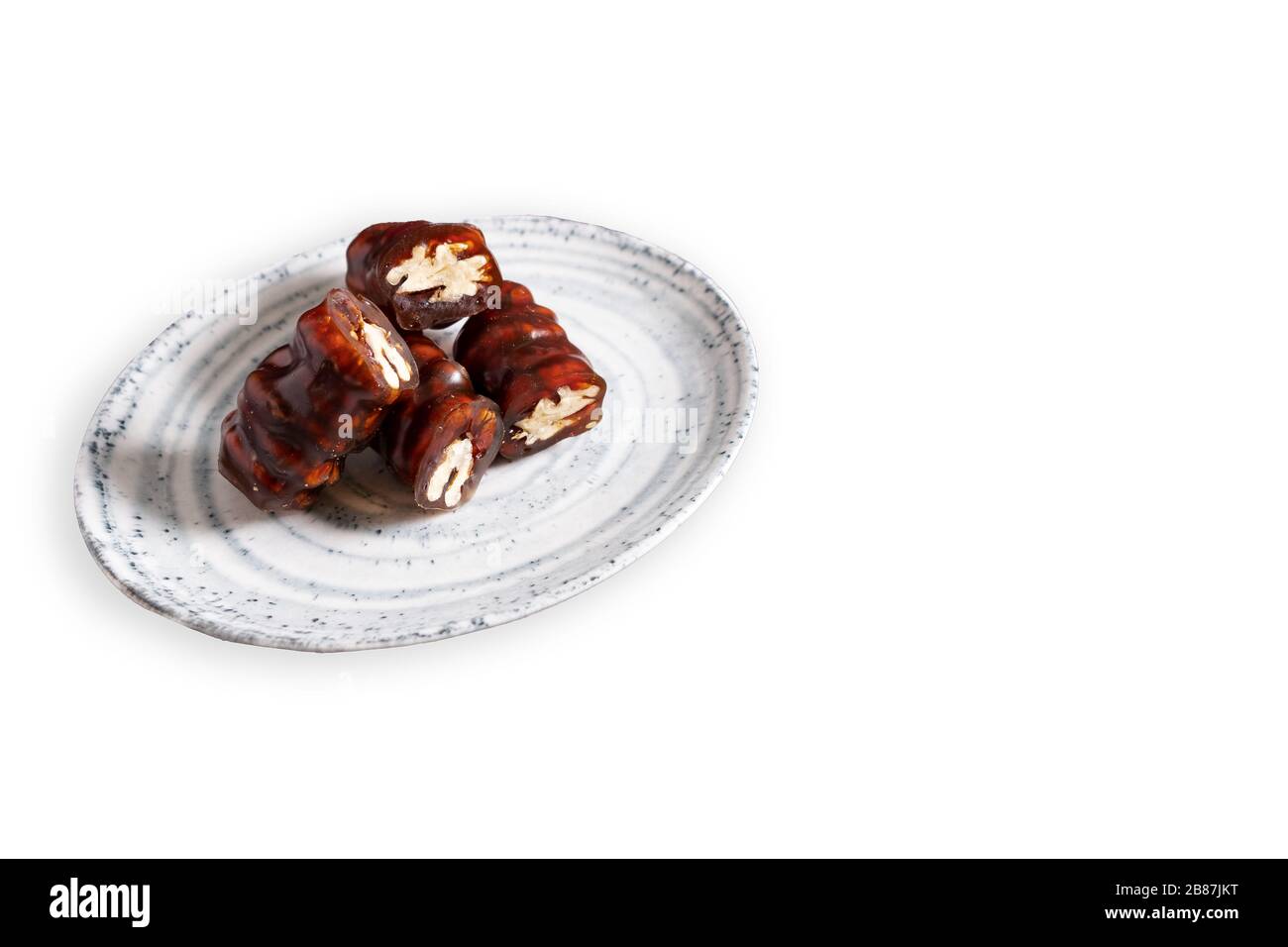 Walnusswurst. Traditioneller türkischer Stil mit Traubenmolasse und Walnüssen. Foto in der Draufsicht. Isoliertes Hintergrundfoto Stockfoto