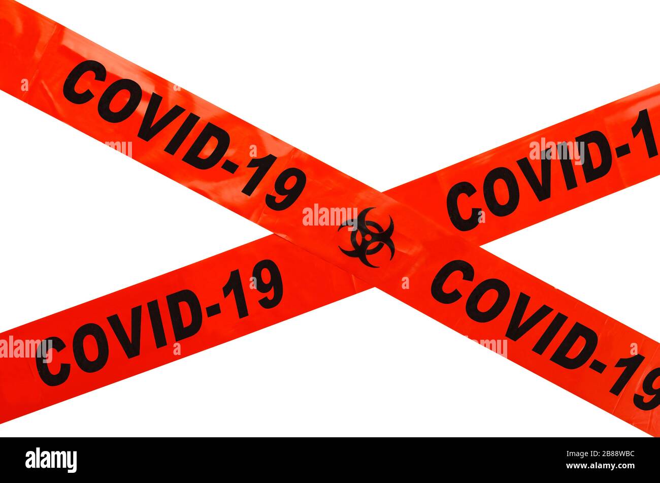 Orangefarbenes und schwarzes Coronavirus Biohazard Tape isoliert auf weißem Hintergrund. Stockfoto
