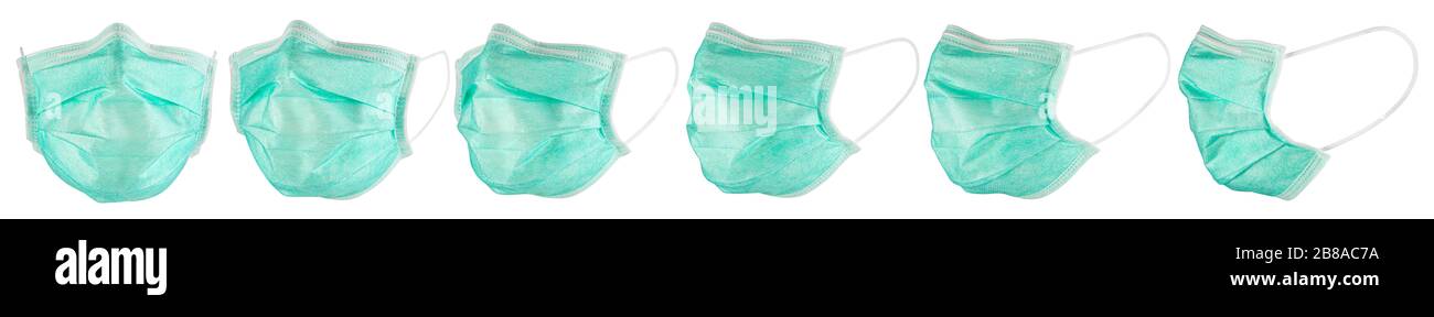 Legen Sie eine Reihe von grün-blauen medizinischen Atemschutzmasken für die Atmung fest, die auf weißem Hintergrund isoliert sind. Schutz vor Coronavirus Covid-19-Prävention Stockfoto