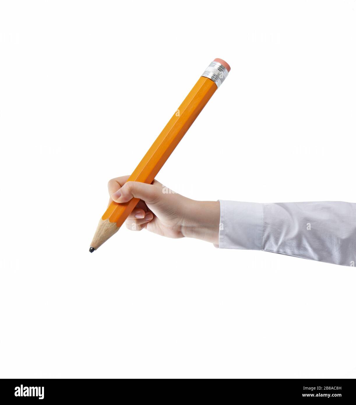 Geschäftsmann schreibt mit großem Stift Stockfoto