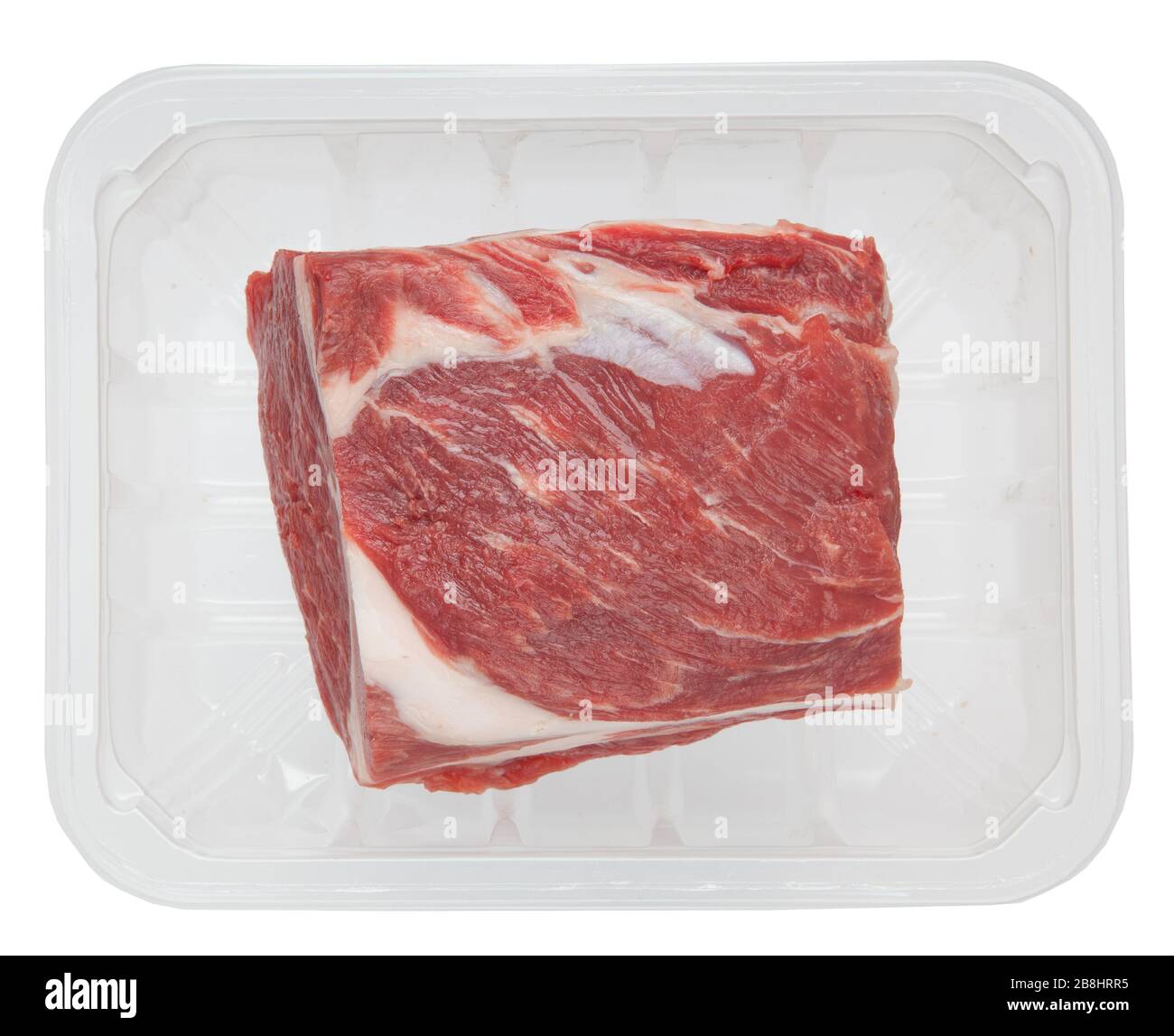 Riesiger roter Fleischkunk in der Box isoliert über weißem Hintergrund Stockfoto
