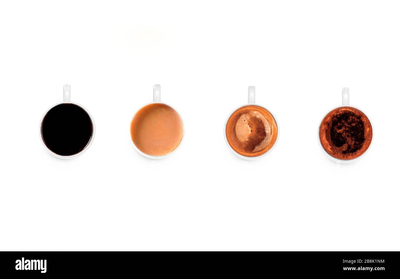 Vier Tassen verschiedener Kaffees, alleine, mit Milch, Cappuccino, Macchiato Stockfoto