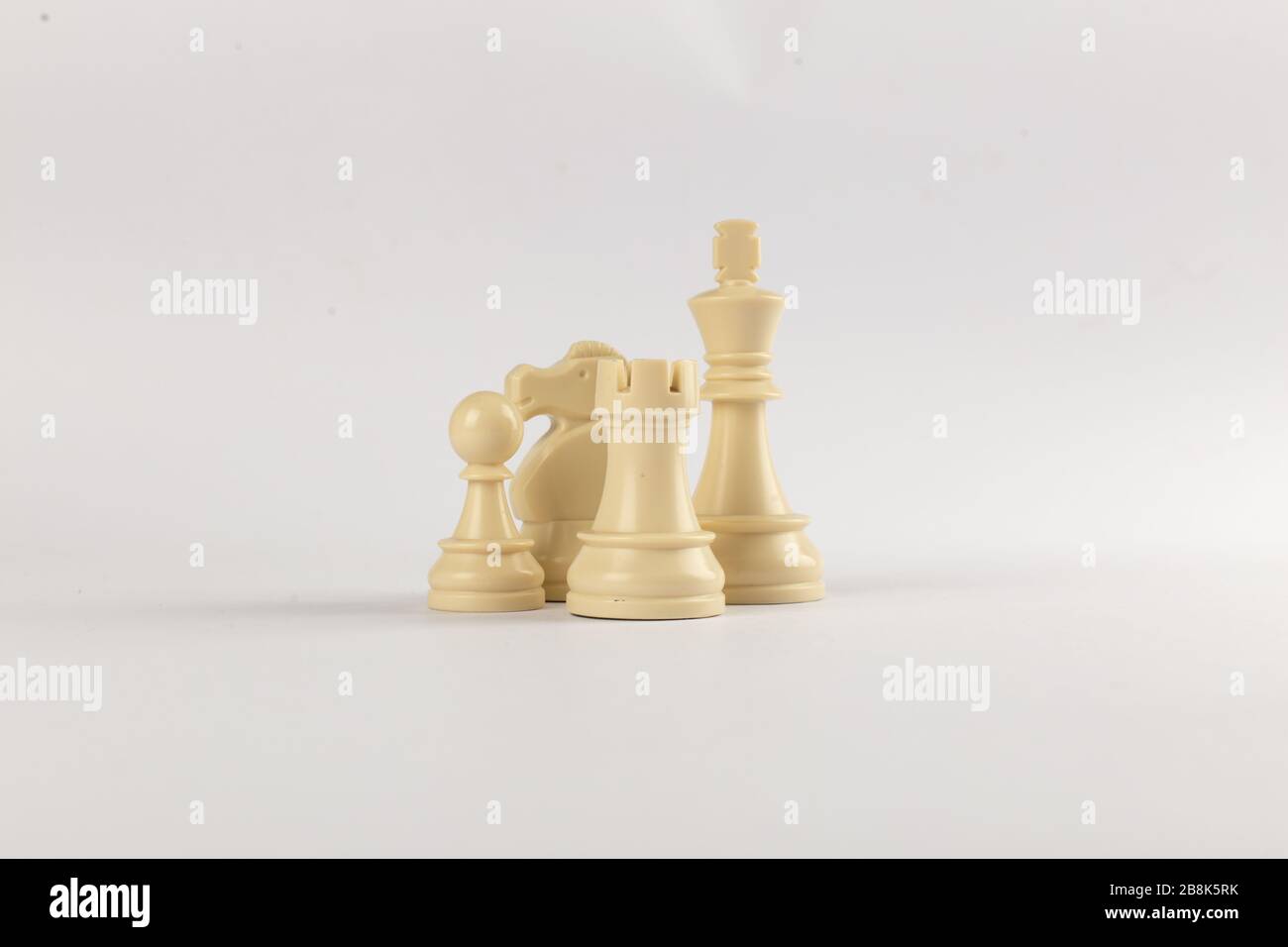 Weiße Figuren isoliert auf weißem Hintergrund Stockfoto