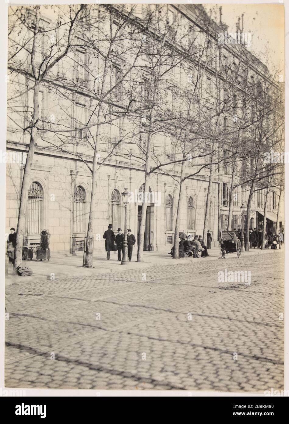 Quai de Gesvres / öffentliche Hilfe. Fassade der öffentlichen Hilfe, quai de Gesvres, 4. Arronndissement, Paris "façade de l'Assistance publique, quai de Gesvres, Paris (IVème arr.)". Photographie d'Hippolyte Blancard (1843-1924), vers 1890. Paris, musée Carnavalet. Stockfoto