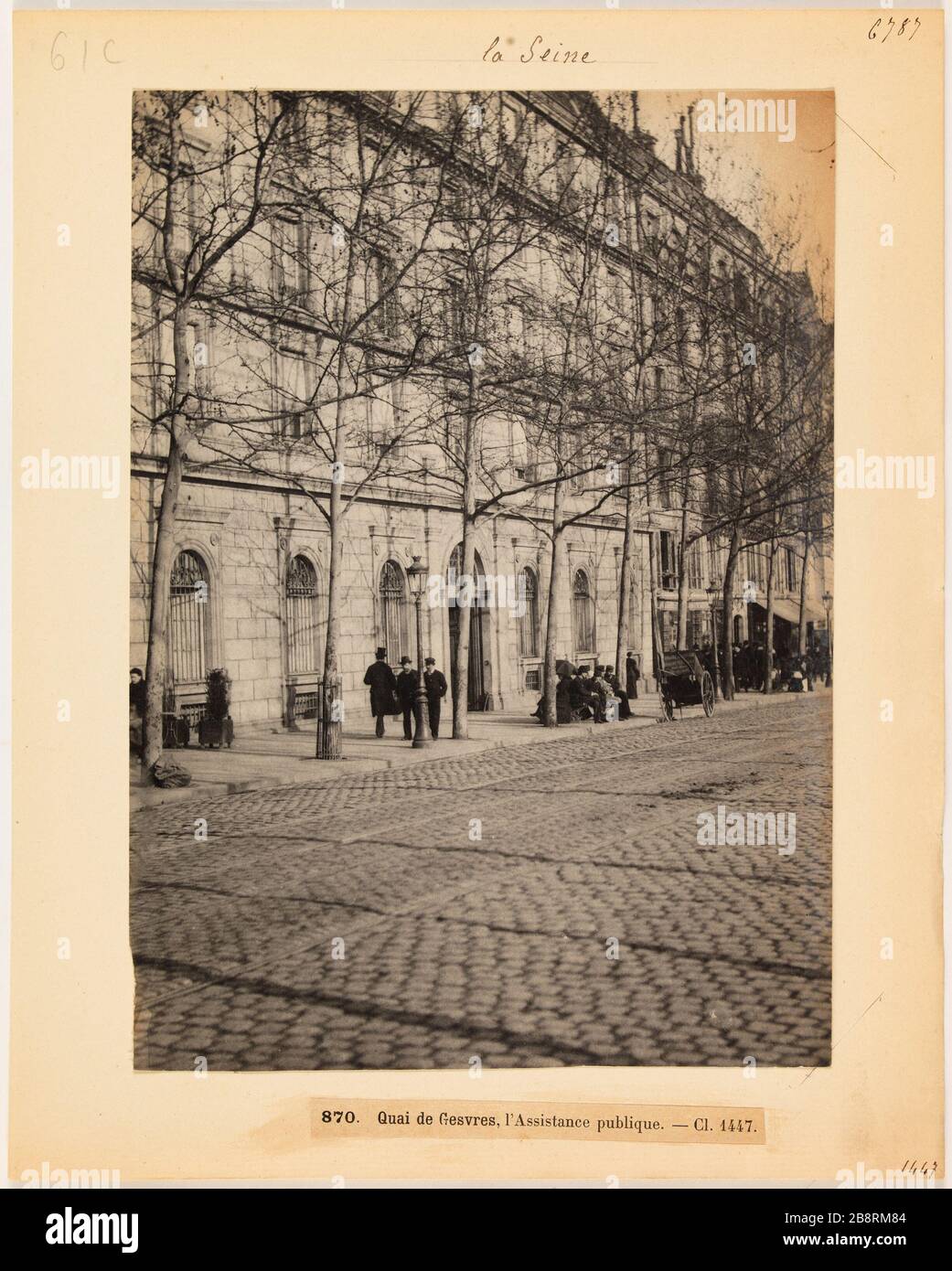 Die seine / 870 Quai de Gesvres, öffentliche Hilfe. - Kl. 1447. Fassade der öffentlichen Wohlfahrt, Dock Gesvres, 4. Arrandisement, Paris "façade de l'Assistance publique, quai de Gesvres, Paris (IVème arr.)". Photographie d'Hippolyte Blancard (1843-1924), vers 1890. Paris, musée Carnavalet. Stockfoto
