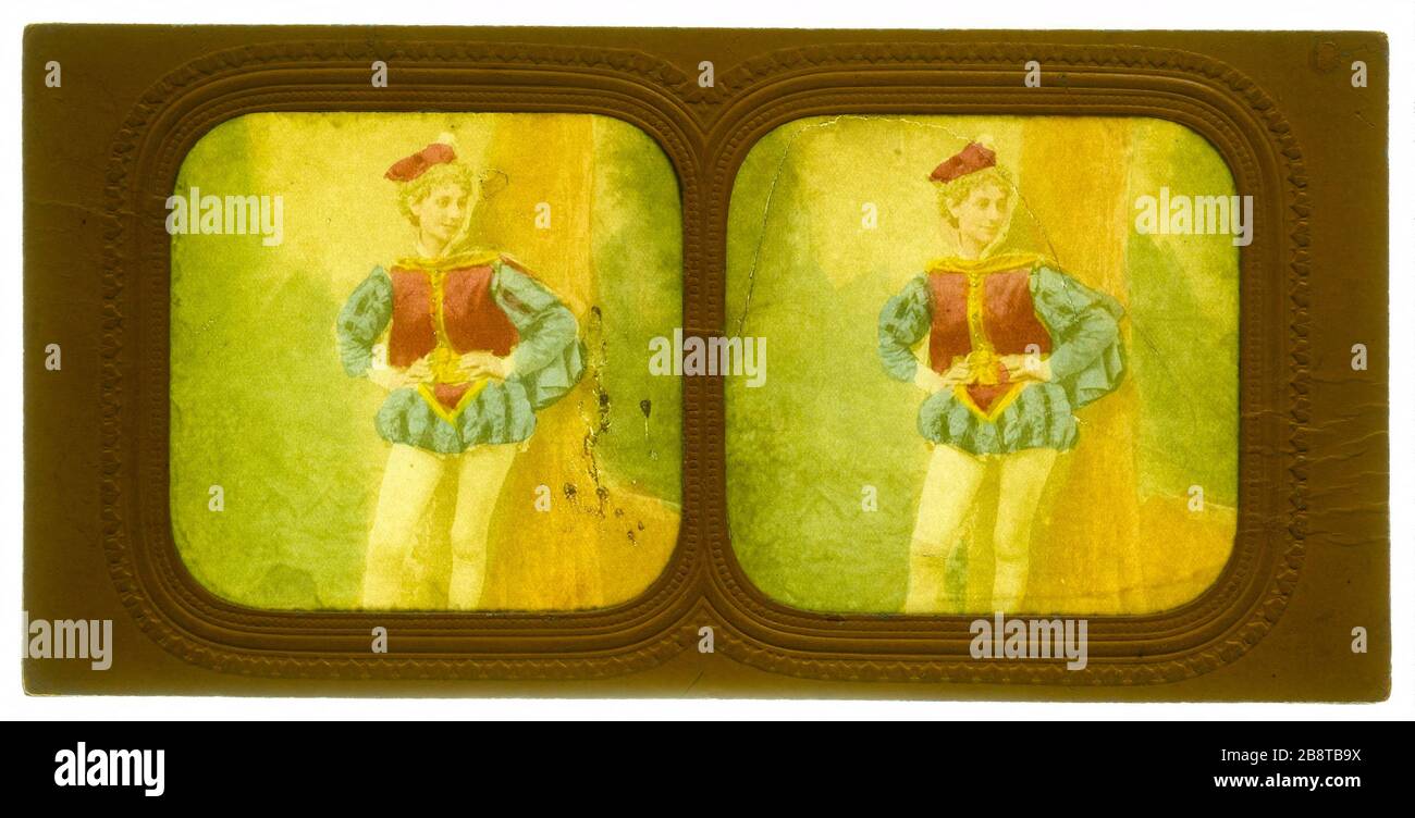 Portrait der Schauspielerin. Portrait der Frau auf der Kostümseite. "Portrait d'actrice en costüm de page". Photographie anonyme. Vue stéréoscopique transparent coloriée sur Papier albuminé. Au recto de l'Image, trous d'épingle. Entre 1870 und 1880. Paris, musée Carnavalet. Stockfoto