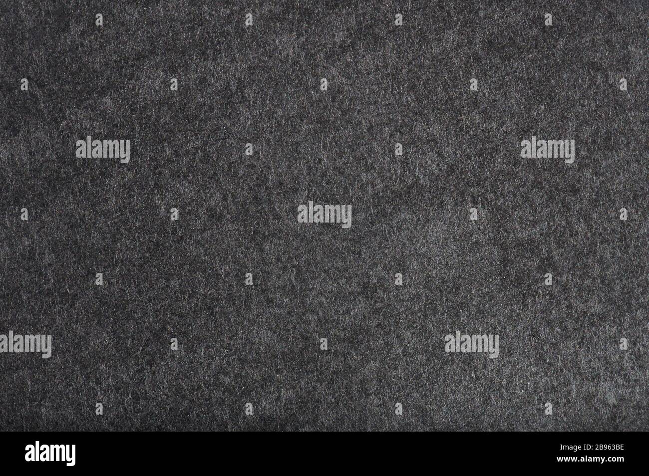 Nahansicht: Hintergrundmakro für schwarzes Leinwandpapier Stockfoto