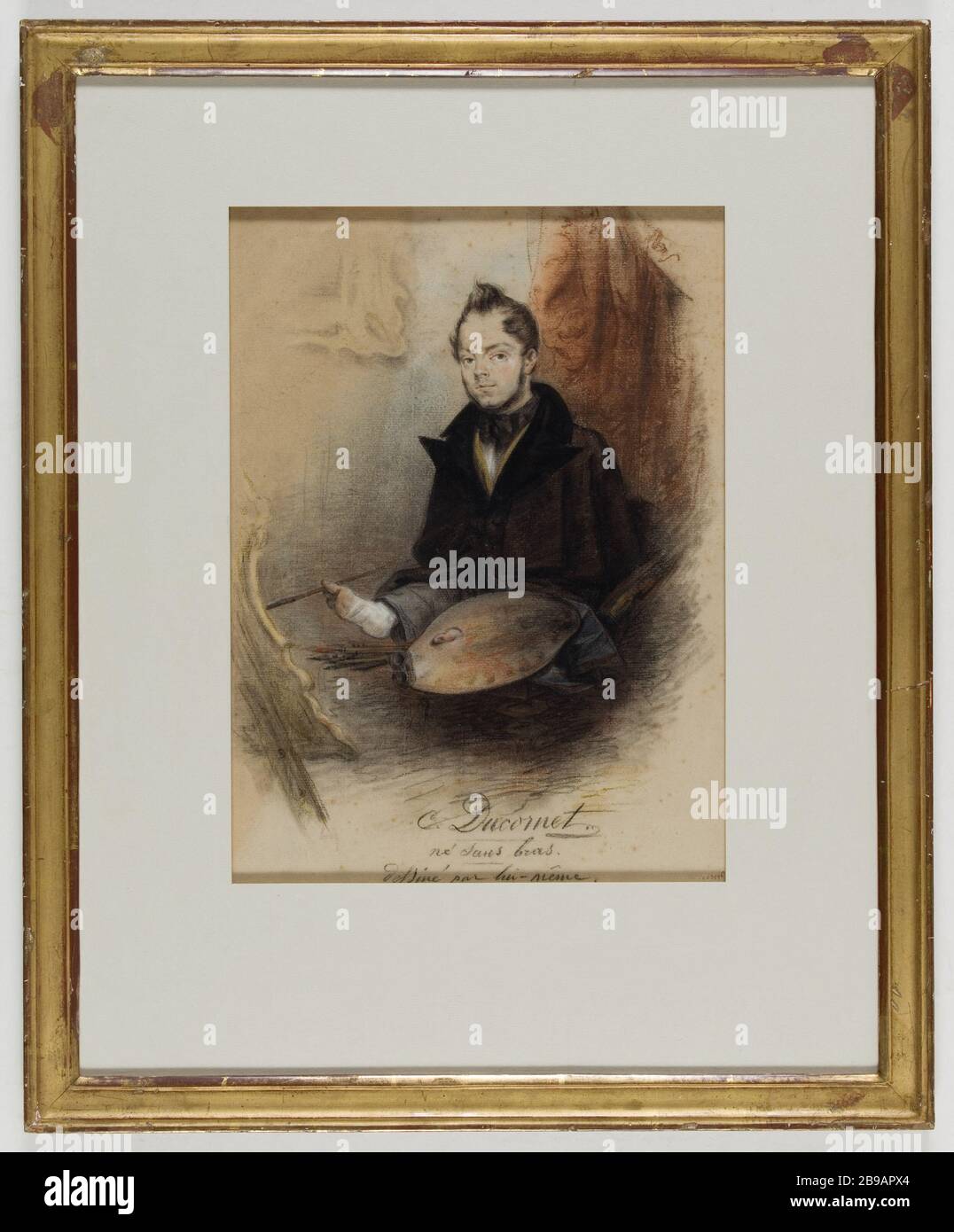 DUCORNET, ARM NICHT, SELBST ENTWORFEN von Cesar Louis Joseph Ducornet (1806-1856). "Nucornet, né sans bras, dessiné par lui-même". Dessins rehaussé de crayons de couleur. Paris, musée Carnavalet. Stockfoto