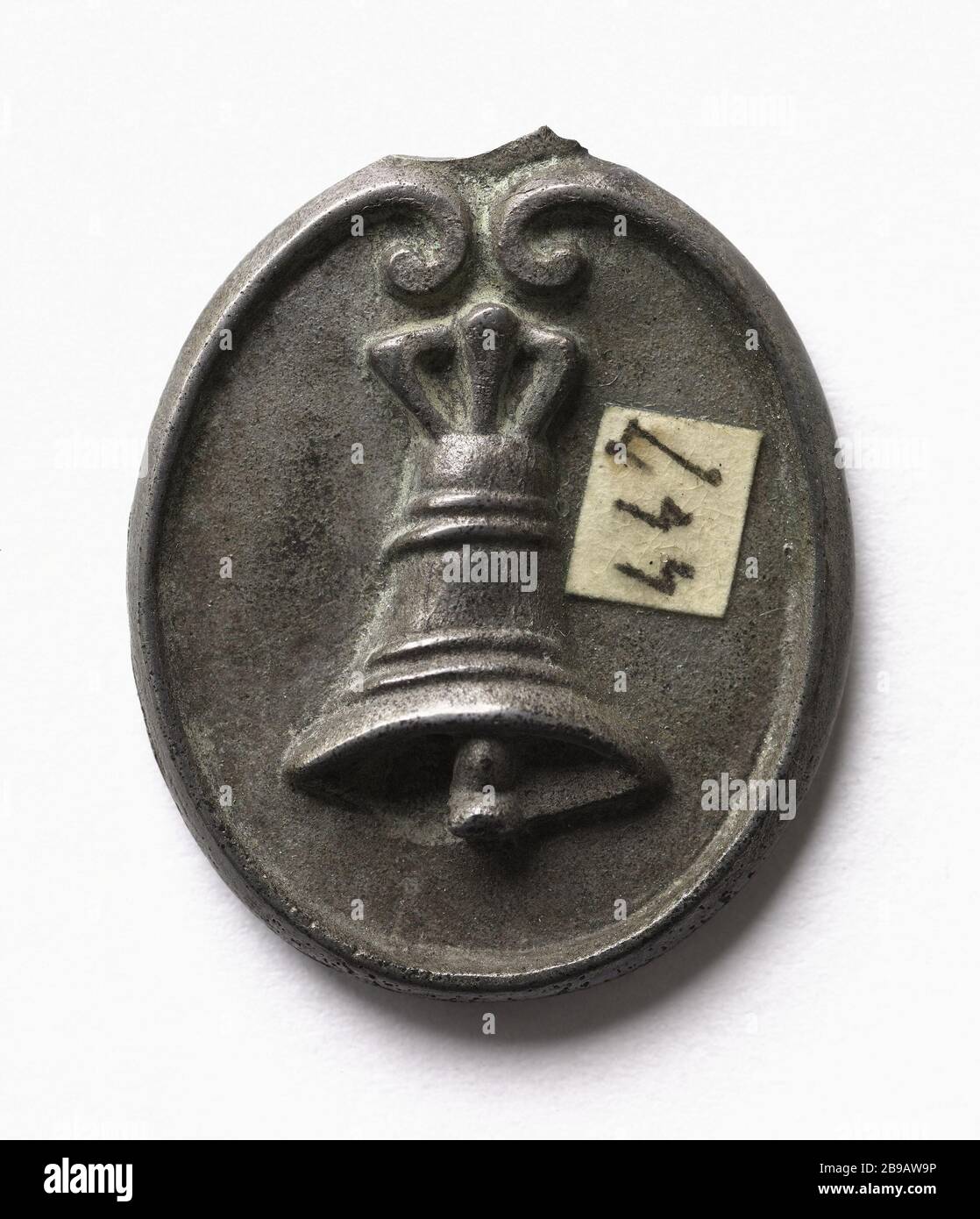 Badge-Glockengießerei-Währungen Barnabiten, Inate () Insige de la fonderie de monnaies de cloche des Barnabites, Inate, Etain. Jahrhunderts. Paris, musée Carnavalet. Stockfoto