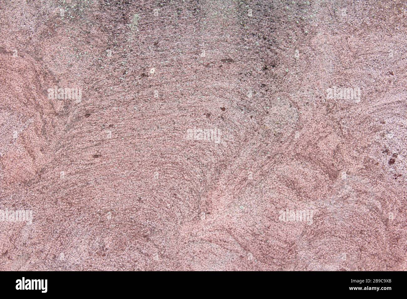 Natürliche Textur aus rosafarbenem Granit. Hintergrund für Text und Design. Stockfoto