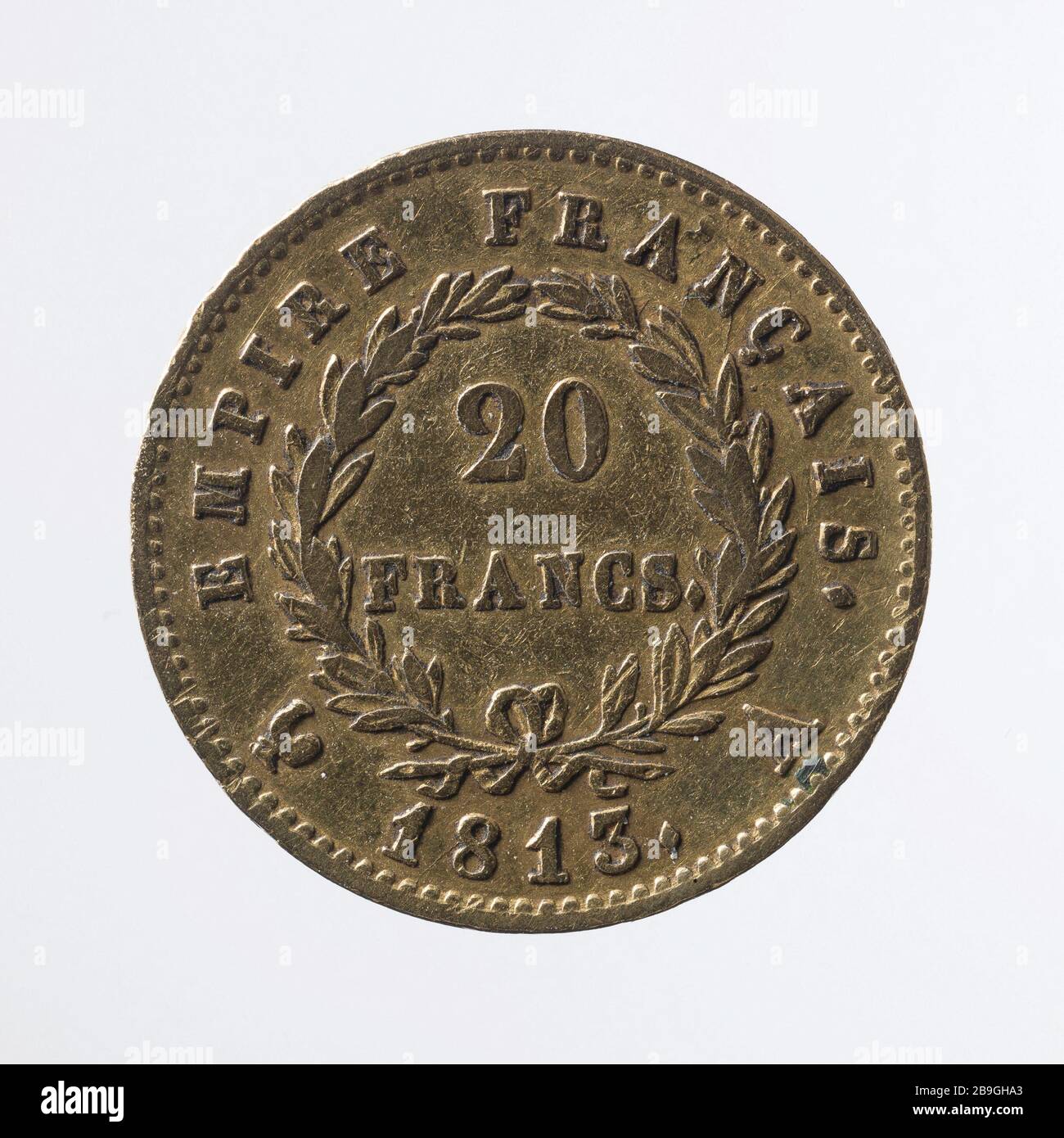 Zwanzig Franken Napoleon Laureatschef von Jean-Pierre Droz (1746-1823). Vingt Francs Napoléon à tête laurée, 1813. Oder, Im Jahr 181. Paris, musée Carnavalet. Stockfoto