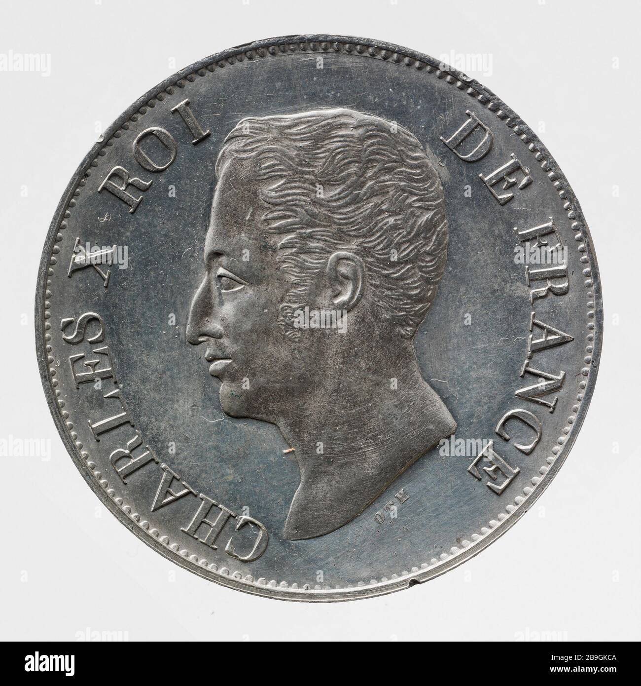 Testen sie uniface für das 5-Franken-Stück von Charles X, 188 Difforth (Messieurs). Essai uniface pour la pièce de 5 Francs de Charles X, 188. Etain, Paris, musée Carnavalet. Stockfoto