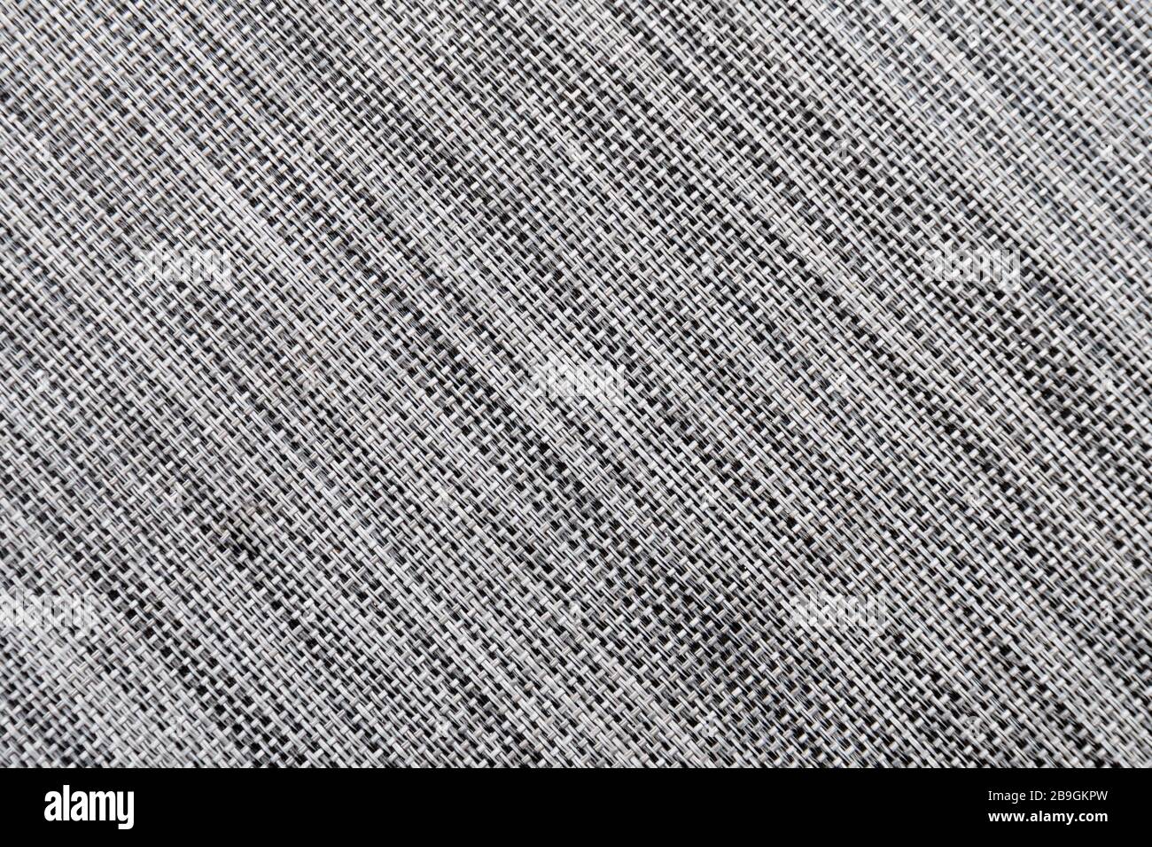Meliertes graues Synthetikmaterial in Grautönen Stockfoto