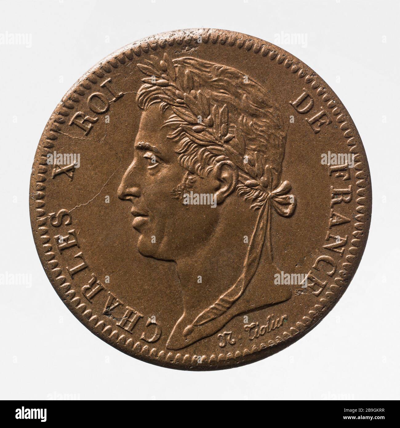 10-Cent-Stück französischer Kolonien von Charles X., Nicolas-Pierre Tiolier (1784-185.00) pièce de 10 Centimes des Colonies francaises de Charles X, 188. Cuivre, Paris, musée Carnavalet. Stockfoto