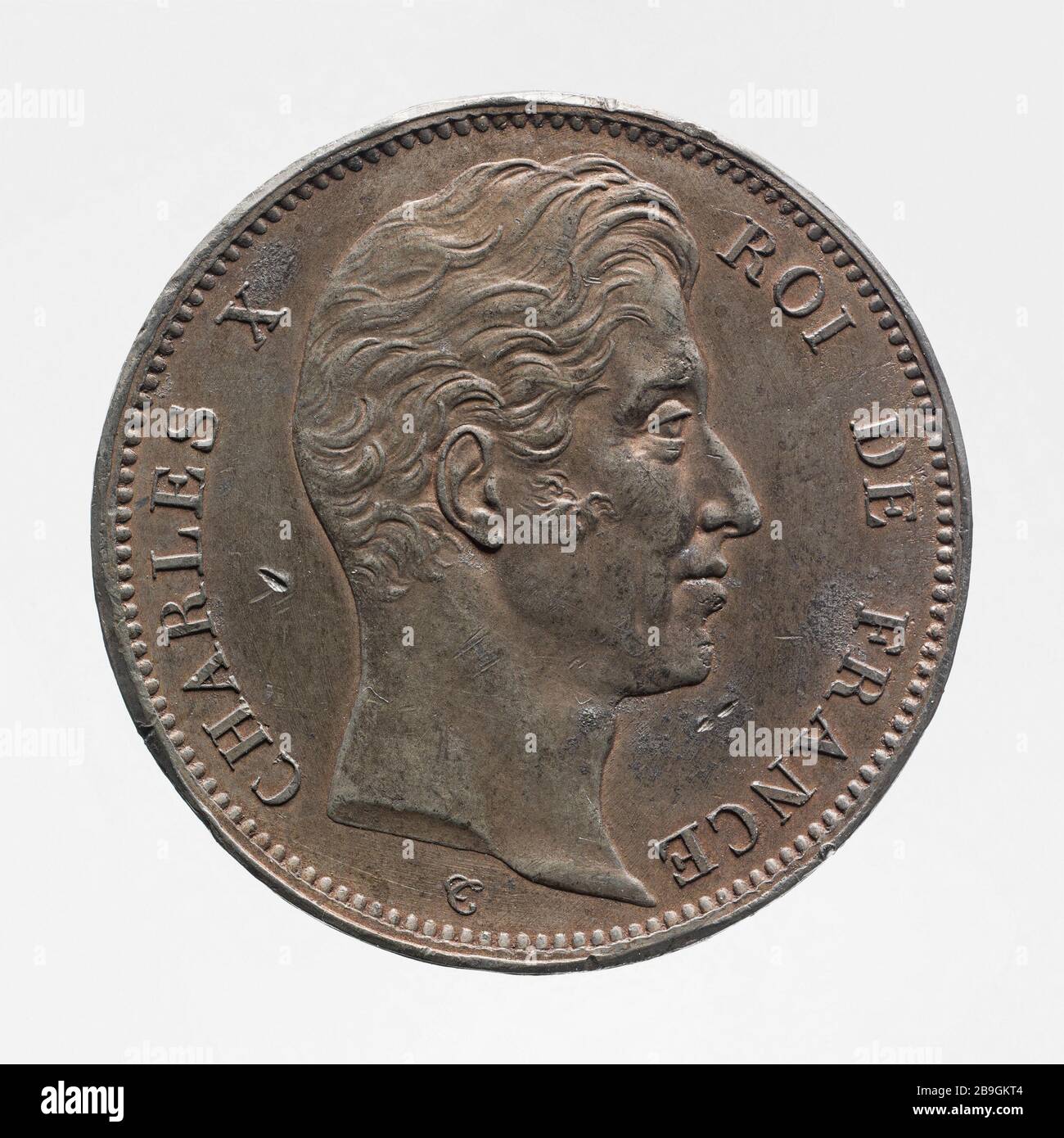 Uniface Test für den Teil von 100 Francs von Charles X, 1830 Essai uniface pour la pièce de 100 Francs de Charles X, 1830. Etain. 1830. Photographie d'Anonyme. Paris, musée Carnavalet. Stockfoto