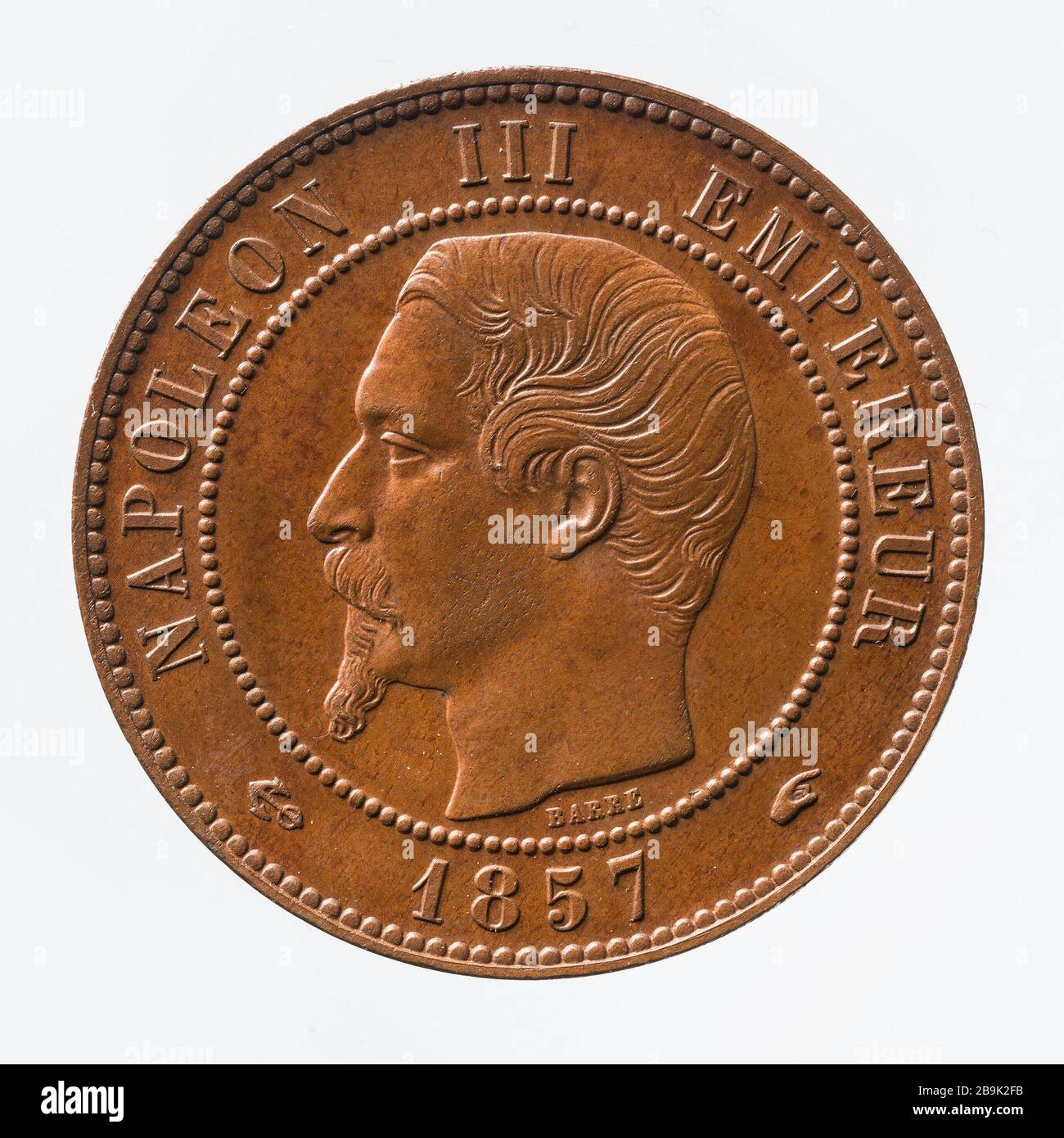 Teil 10 Cents Kupfer Napoleon, 1857 Albert-Désiré Barré (1818-1878). pièce de 10 centimes en cuivre de Napoléon III, 1857. Cuivre. 1857. Paris, musée Carnavalet. Stockfoto