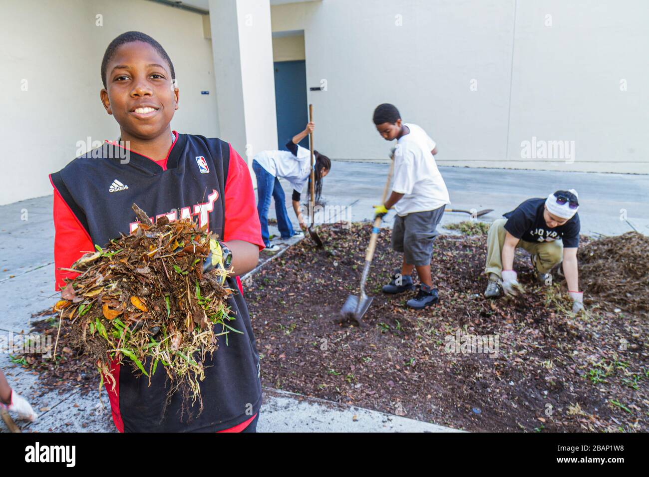 Miami Florida,Hands on HandsAm Miami MLK Day of Service,Martin Luther King Jr. Geburtstag,Northwestern High School,Campus,Studenten,Volunteer Vol Stockfoto