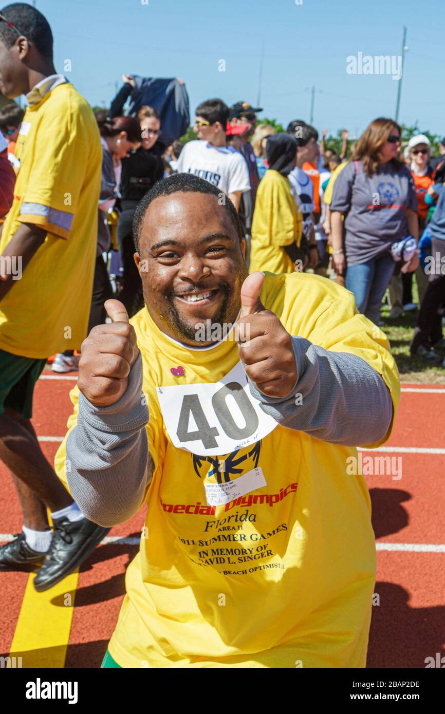 Miami Florida, Liberty City, Traz Powell Stadium, Special Olympics, Bedürfnisse, Track & Field geistig behinderte Menschen, besondere Bedürfnisse, eingeschränkt, schwarzer Mann, Stockfoto