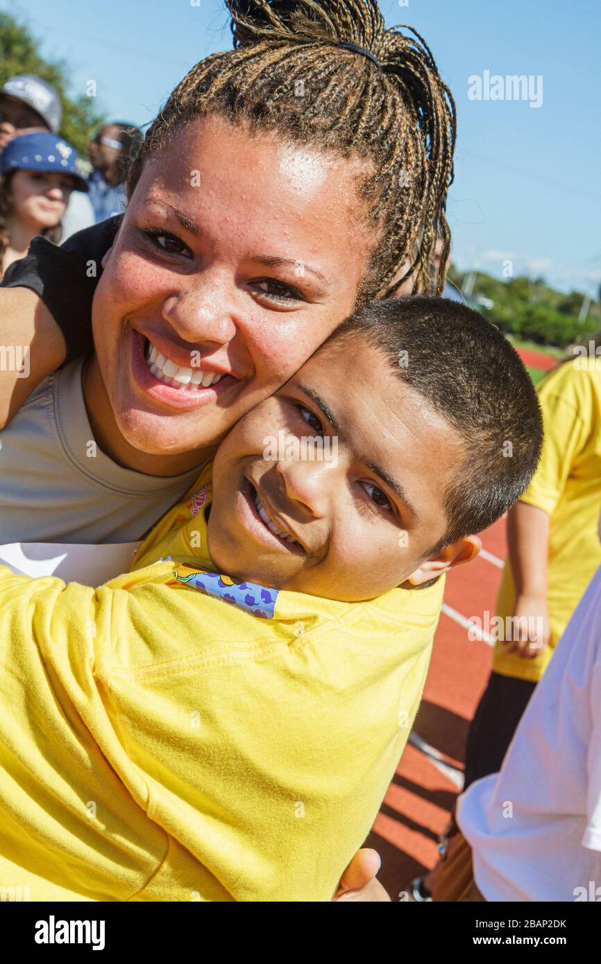 Miami Florida, Liberty City, Traz Powell Stadium, Special Olympics, Bedürfnisse, Track & Field geistig Behinderte spezielle Bedürfnisse, eingeschränkt, Hispanic La Stockfoto