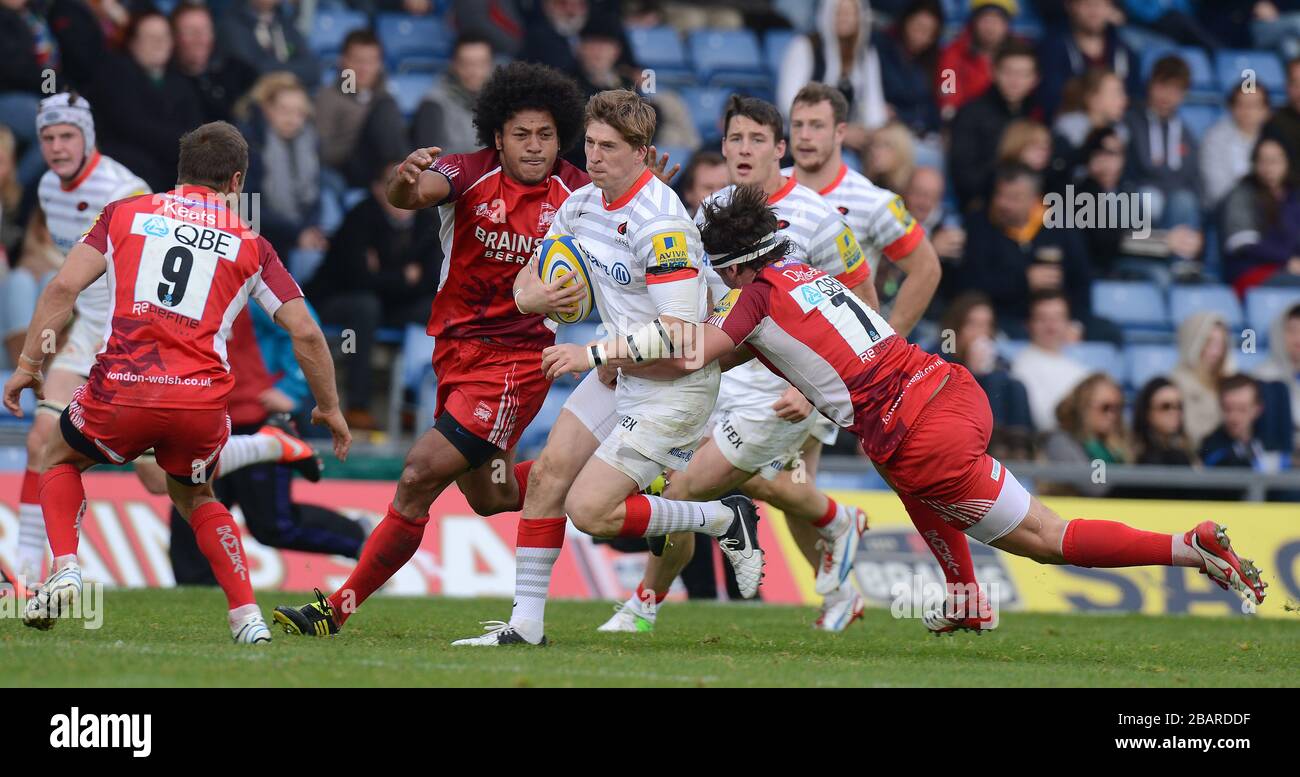 Die Londoner walisischen Hudson Tonga'uiha (links) und Mike Denbee (rechts) gehen gegen Saracens' David Strettle vor Stockfoto