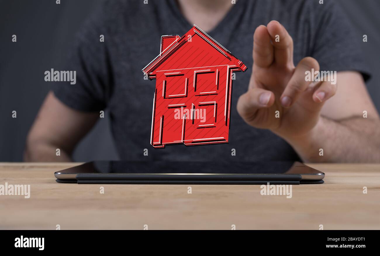 Ein digitales kleines Haus mit Dachkonzept Stockfoto