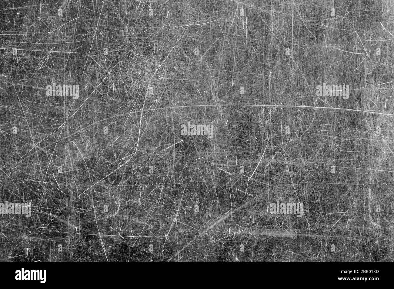 Nahaufnahme der zerkratzten Glasoberfläche. Schwarz und Weiß. Stockfoto