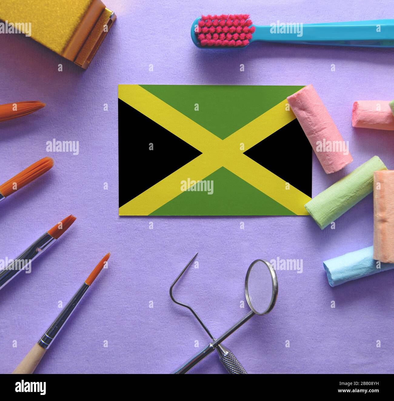 Zahnarztkonzept mit Instrumenten - konzeptionelles Bild des Zahnpflegesystems von Jamaika Stockfoto