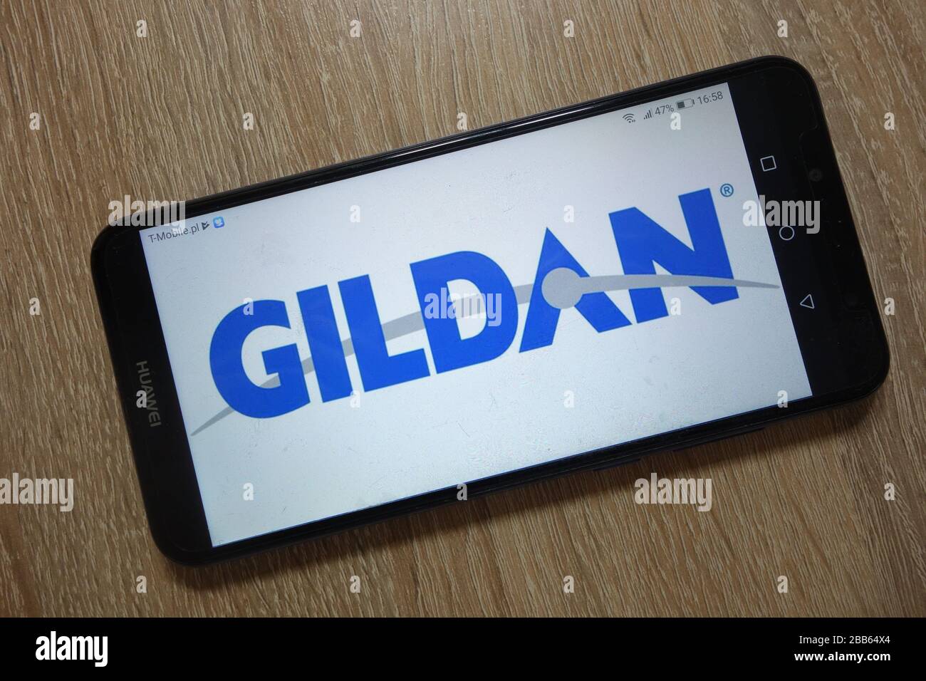 Das Gildan Activewear Logo wird auf dem Smartphone angezeigt Stockfoto