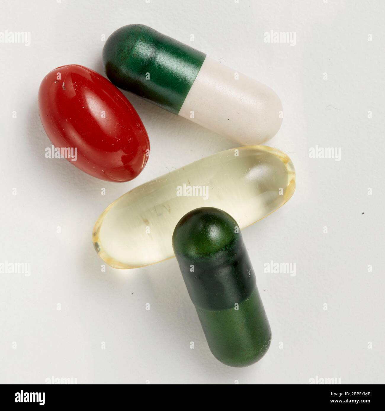 Tabletten ergänzen die Mediapillen rund um die Gruppe Behälterschlauch Stockfoto