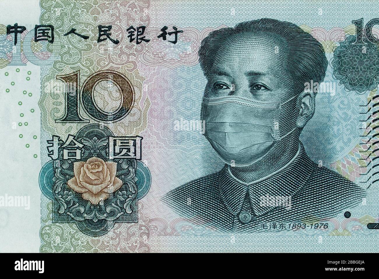 COVID-19 Coronavirus in China. Chinesische Geld-Yuan Stockfoto