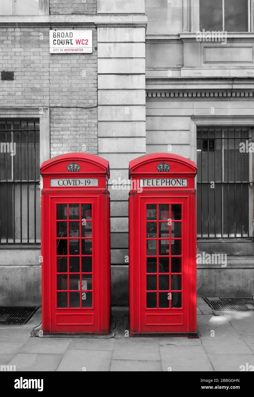 Abbildung: Coronavirus oder Covid 19 auf British Red Telephone Boxes, London, England, Großbritannien Stockfoto