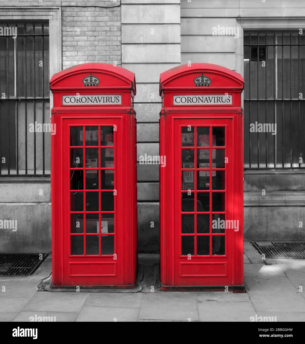 Abbildung: Coronavirus oder Covid 19 auf British Red Telephone Boxes, London, England, Großbritannien Stockfoto