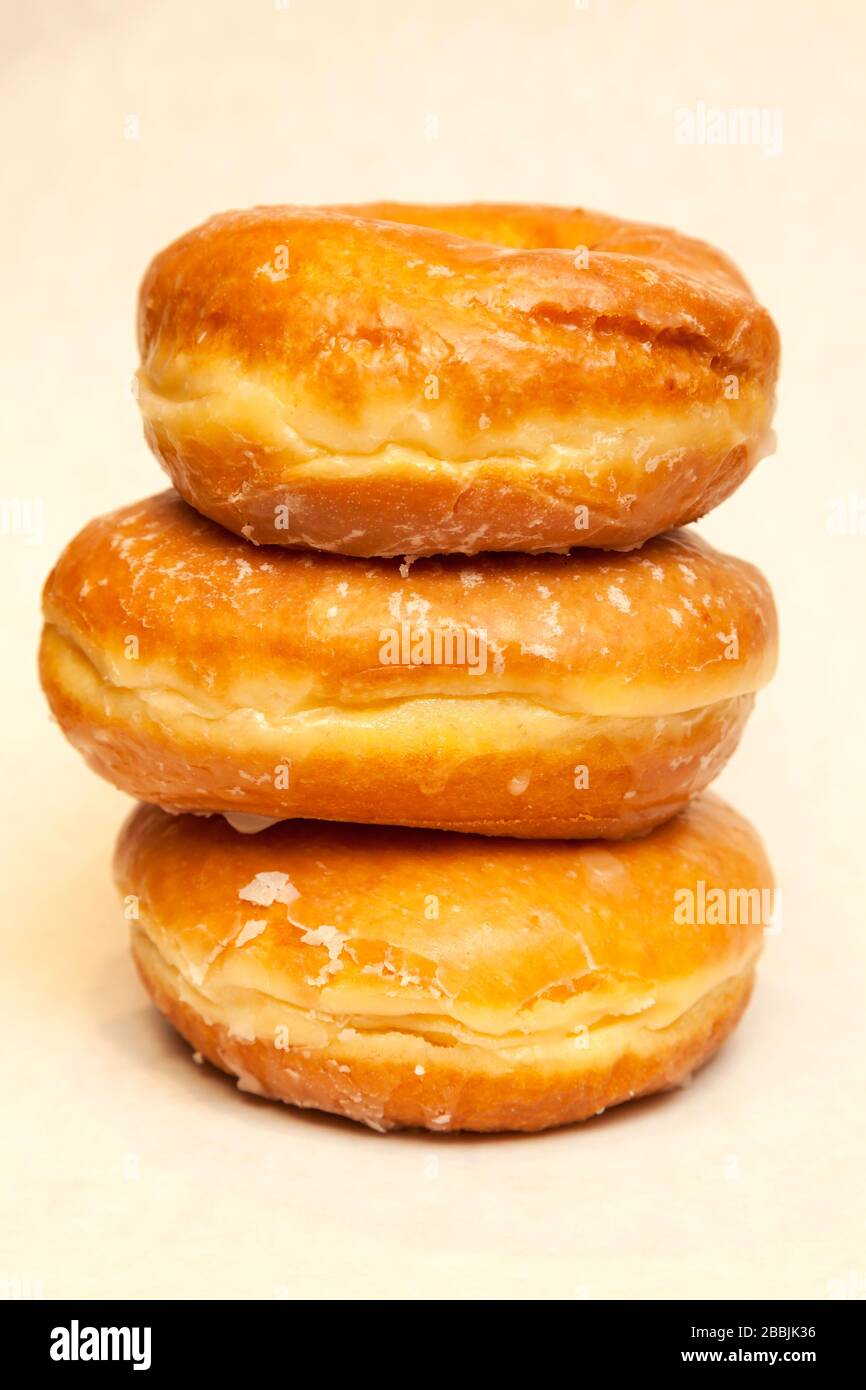 Glasierte Doughnuts, Gebäck, von James D Coppinger/Dembinsky Photo Assoc Stockfoto