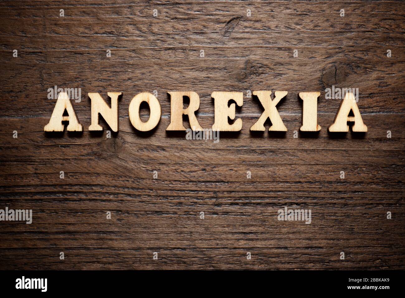 Magersucht Wort auf einem Holztisch. Stockfoto