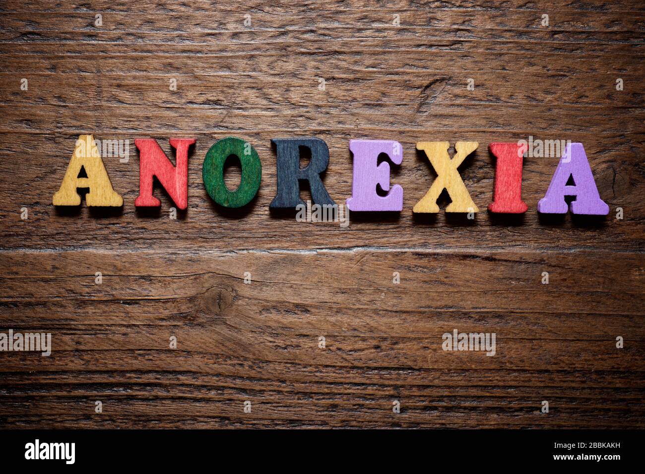 Magersucht Wort auf einem Holztisch. Stockfoto