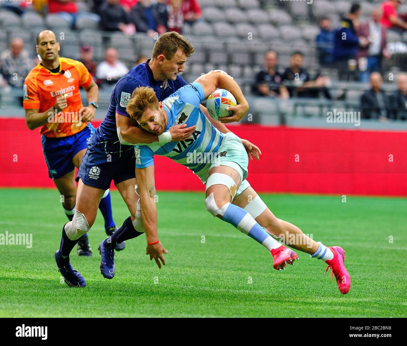 Vancouver, Kanada. März 2020. Matías Osadczuk #9 von Argentinien, das Paddy Kelly #1 von Schottland in Spiel #27 (9. Platz Viertelfinale) Durin in Angriff nahm Stockfoto