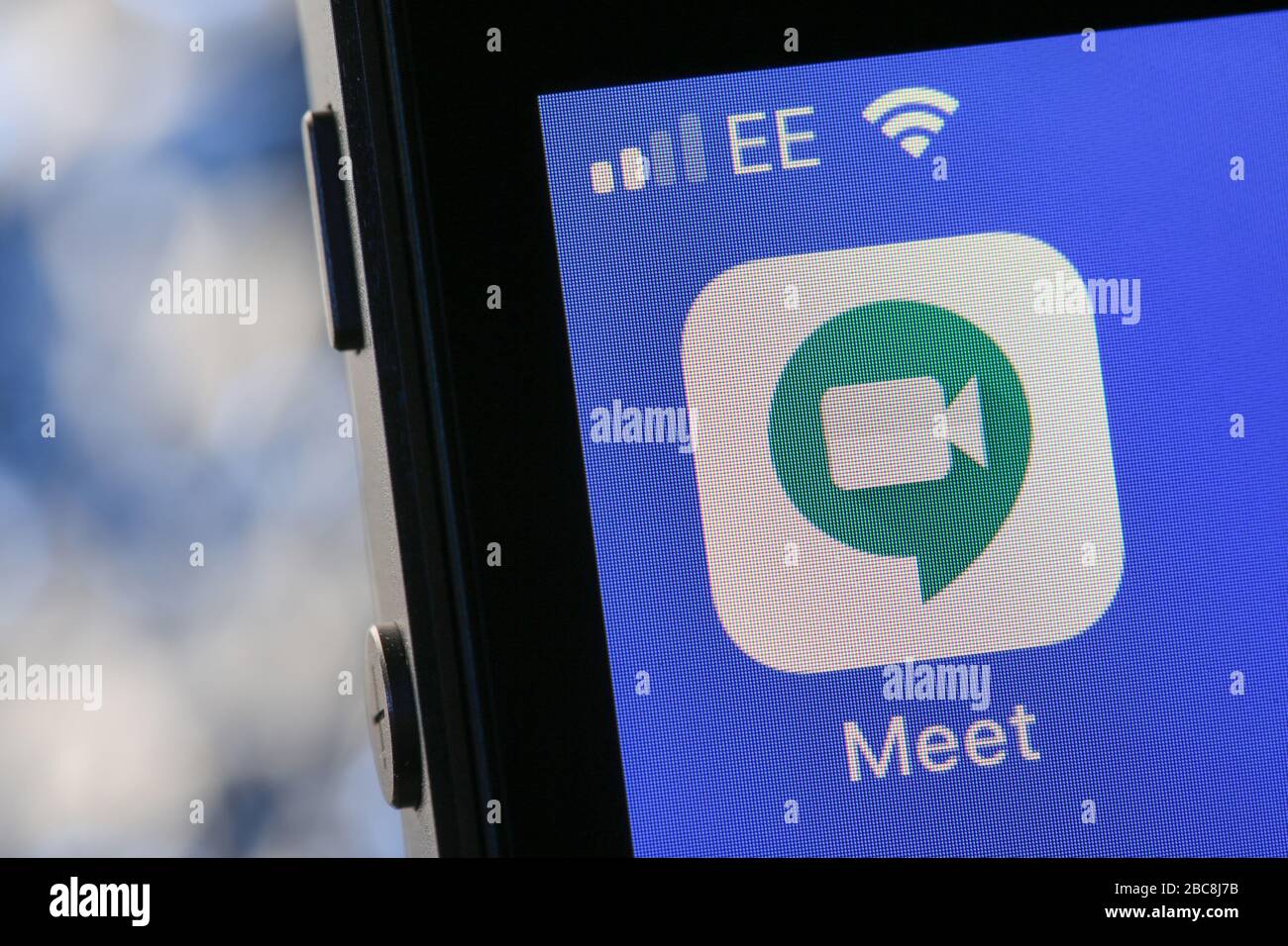 Google Meet App auf einem iPhone. Stockfoto