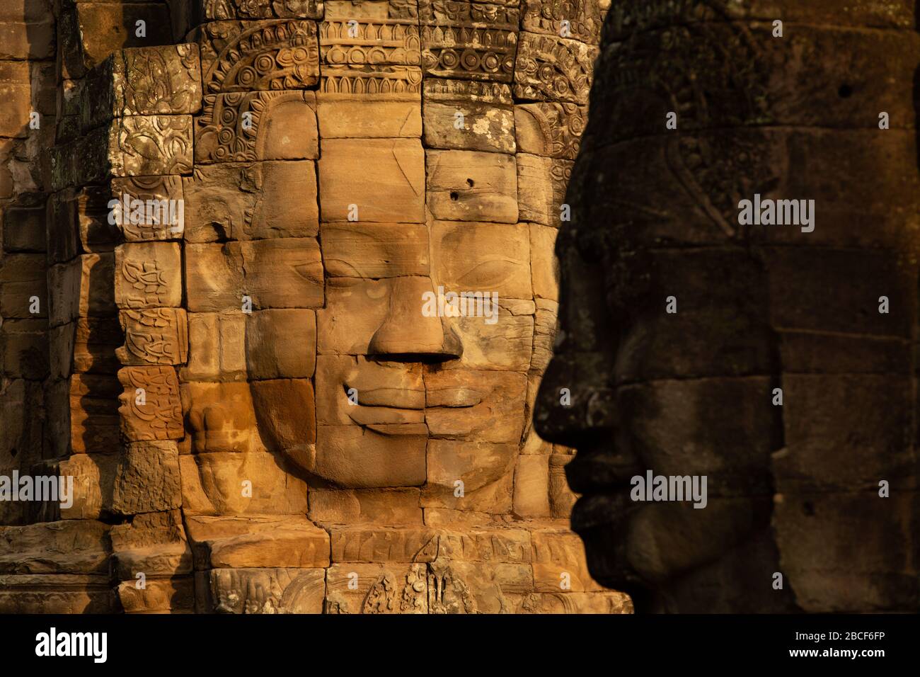 Angkor Tom, Bayon Smilie Gesichter Stockfoto