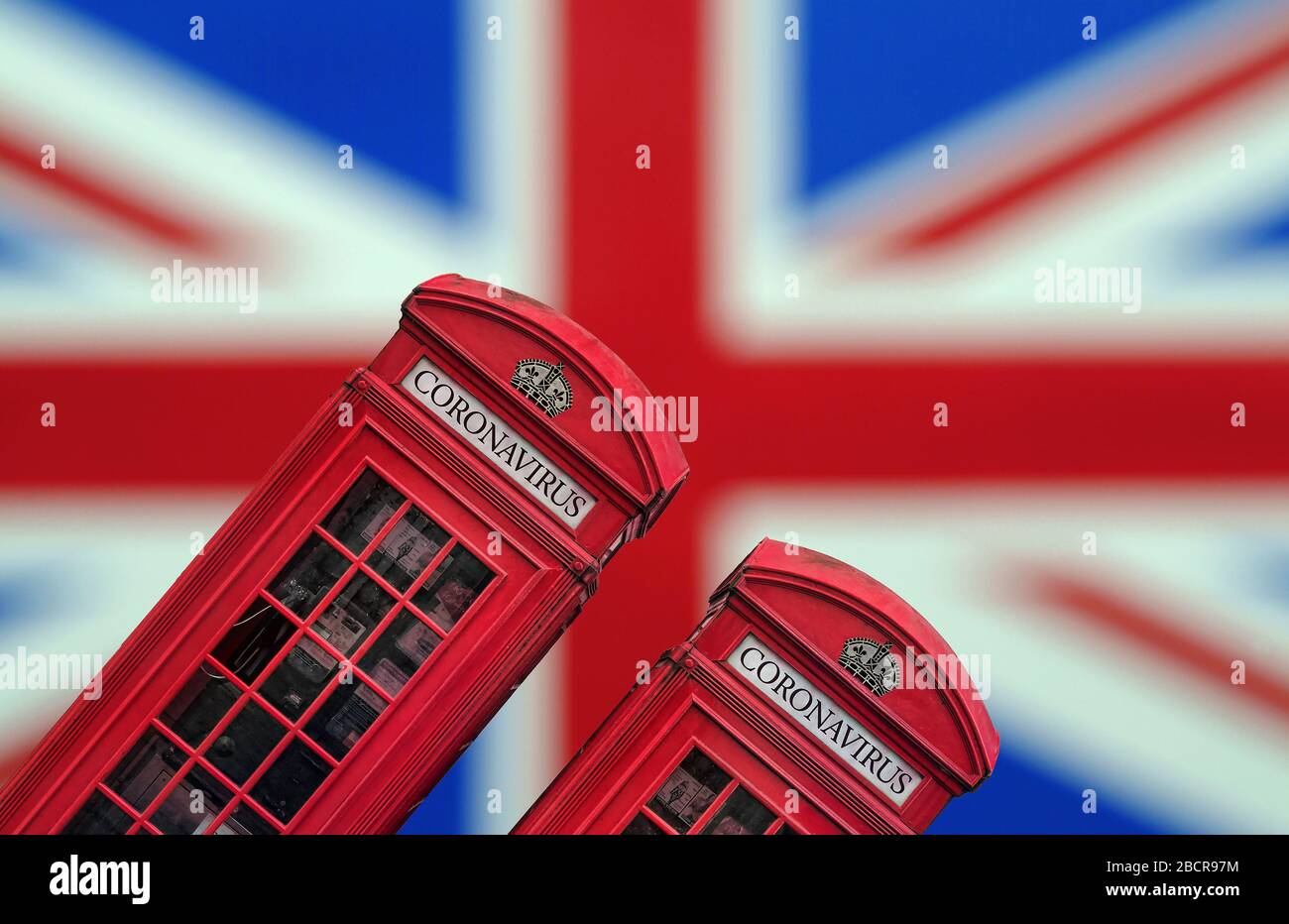 Coronavirus British Red Telephone Box auf Union Jack Hintergrund Stockfoto
