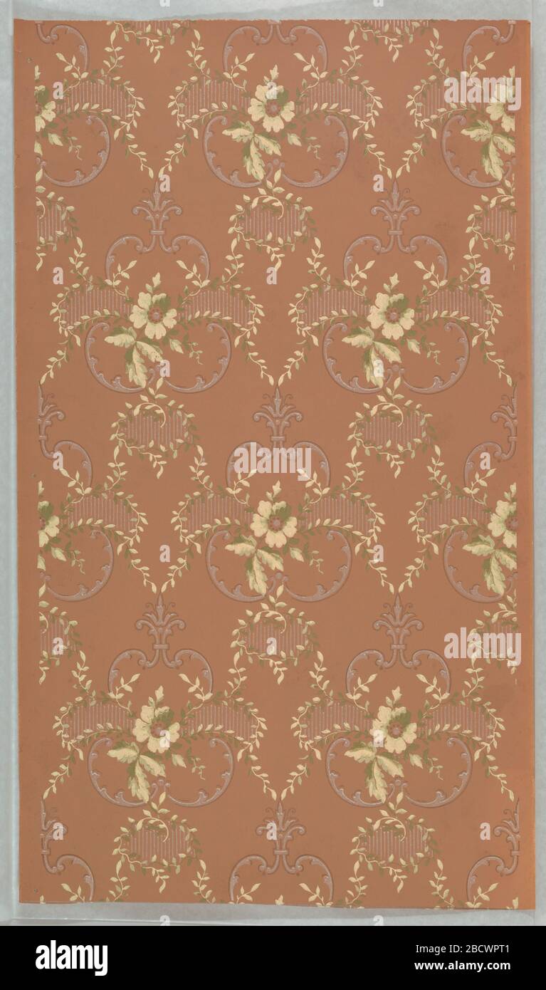 Seitenwand. Forschung im ProgressRepeating Design eines einzelnen Blumenmotivs, umgeben von Folienblättern. Motive werden durch Gelierblättrige Sprigs miteinander verbunden. Gedruckt in Grün, Gelb und Off-Weiß auf Terrakotta/braunem Boden. Seitenwand Stockfoto