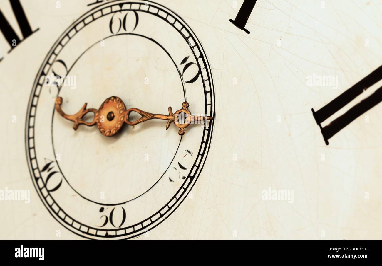 Nahaufnahme mit dem zweiten Handrad und dem Finger der Vintage-Uhr Stockfoto