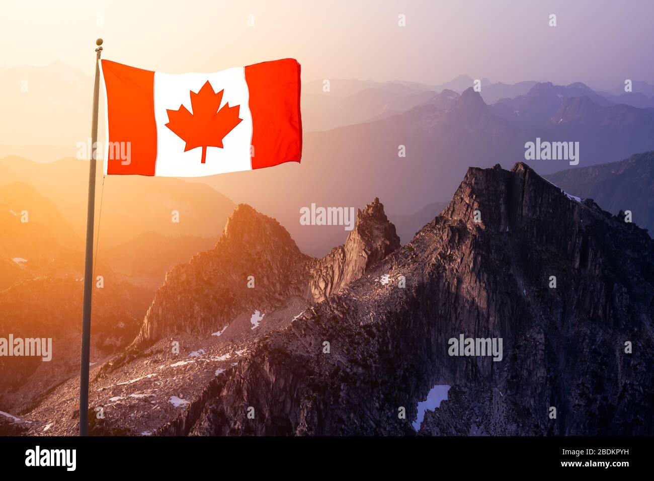 Canadian National Flag Composite Over the Aerial View of Beautiful Rocky Mountain Stockfoto