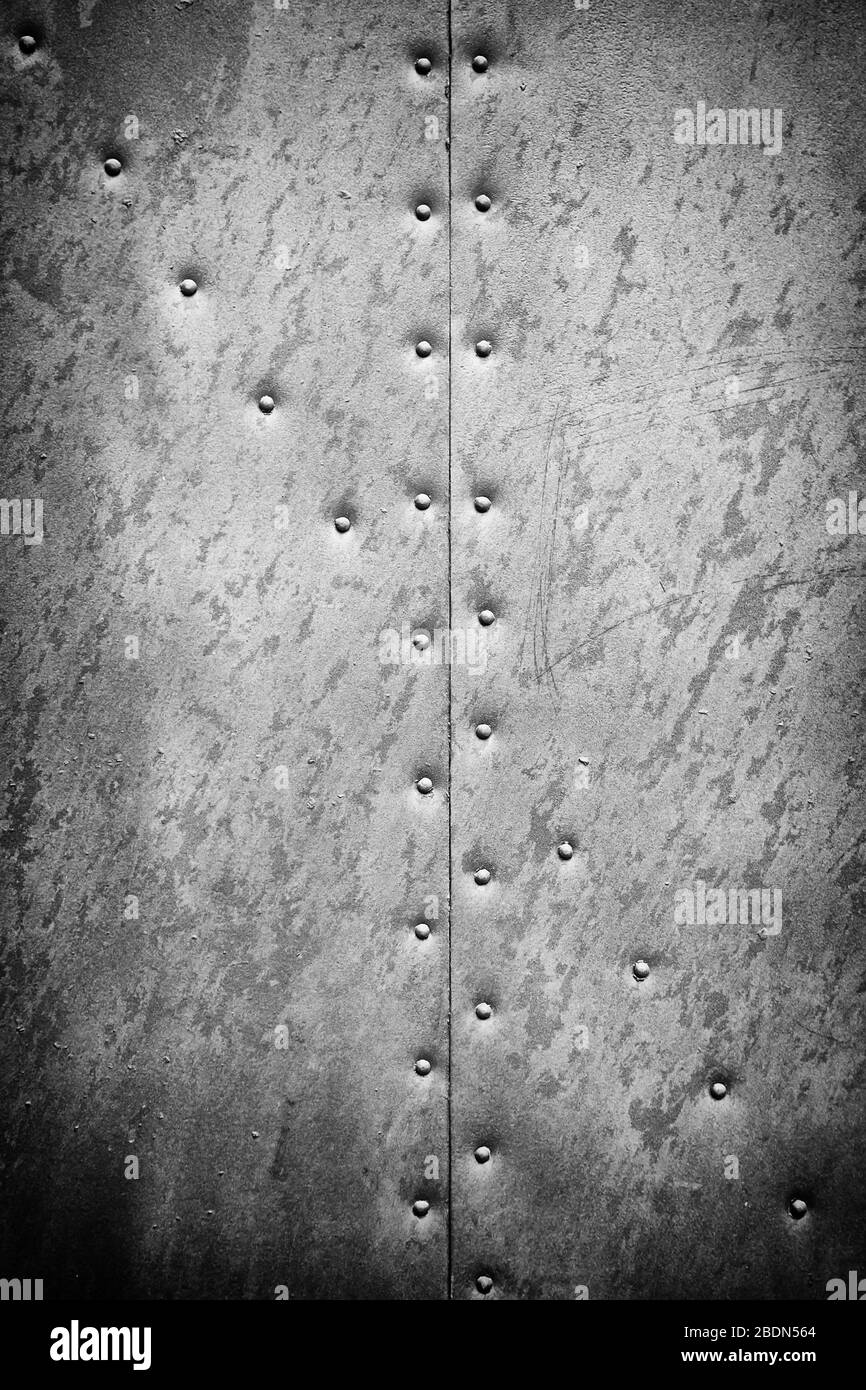 Metall wand Textur, Detail von einer Wand mit Nieten Metall Hintergrund mit Textur Stockfoto