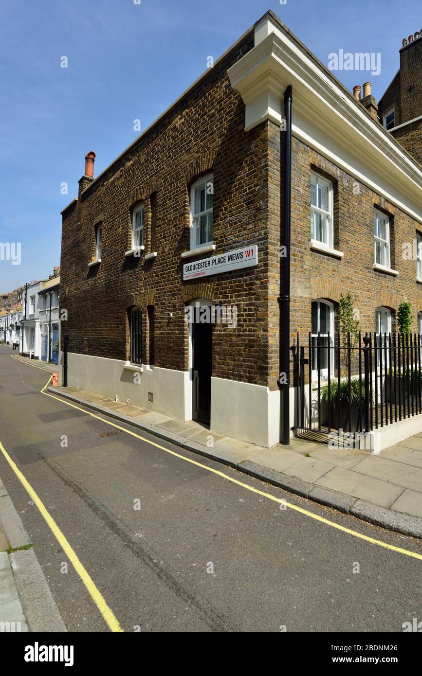 Terrassenförmige Luxury Residential Mews Houses, Gloucester Place Mews, Belgravia, West London, Großbritannien Stockfoto
