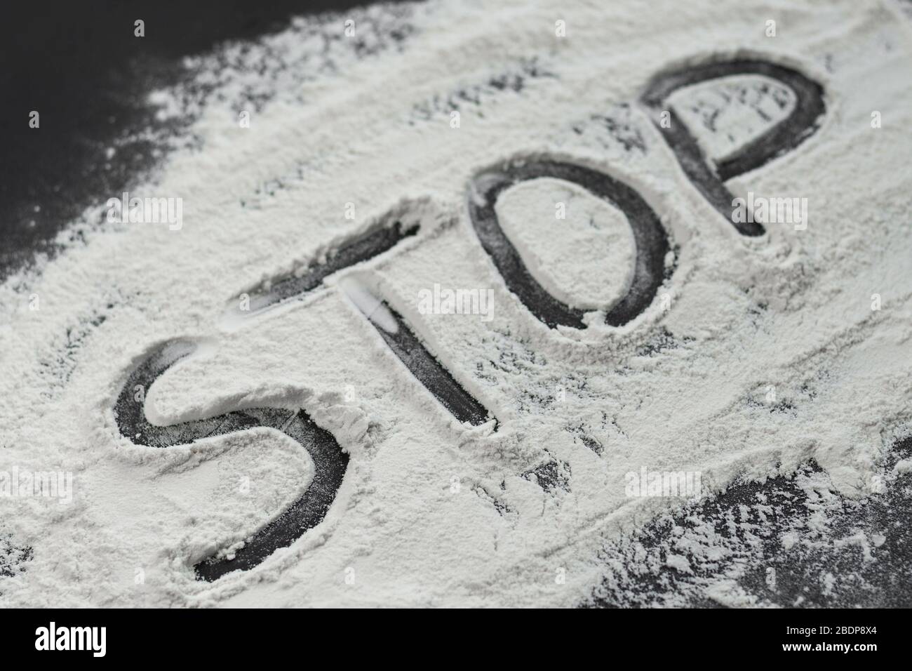 Selektive Fokus, das Wort Stop von Mehl Stockfoto