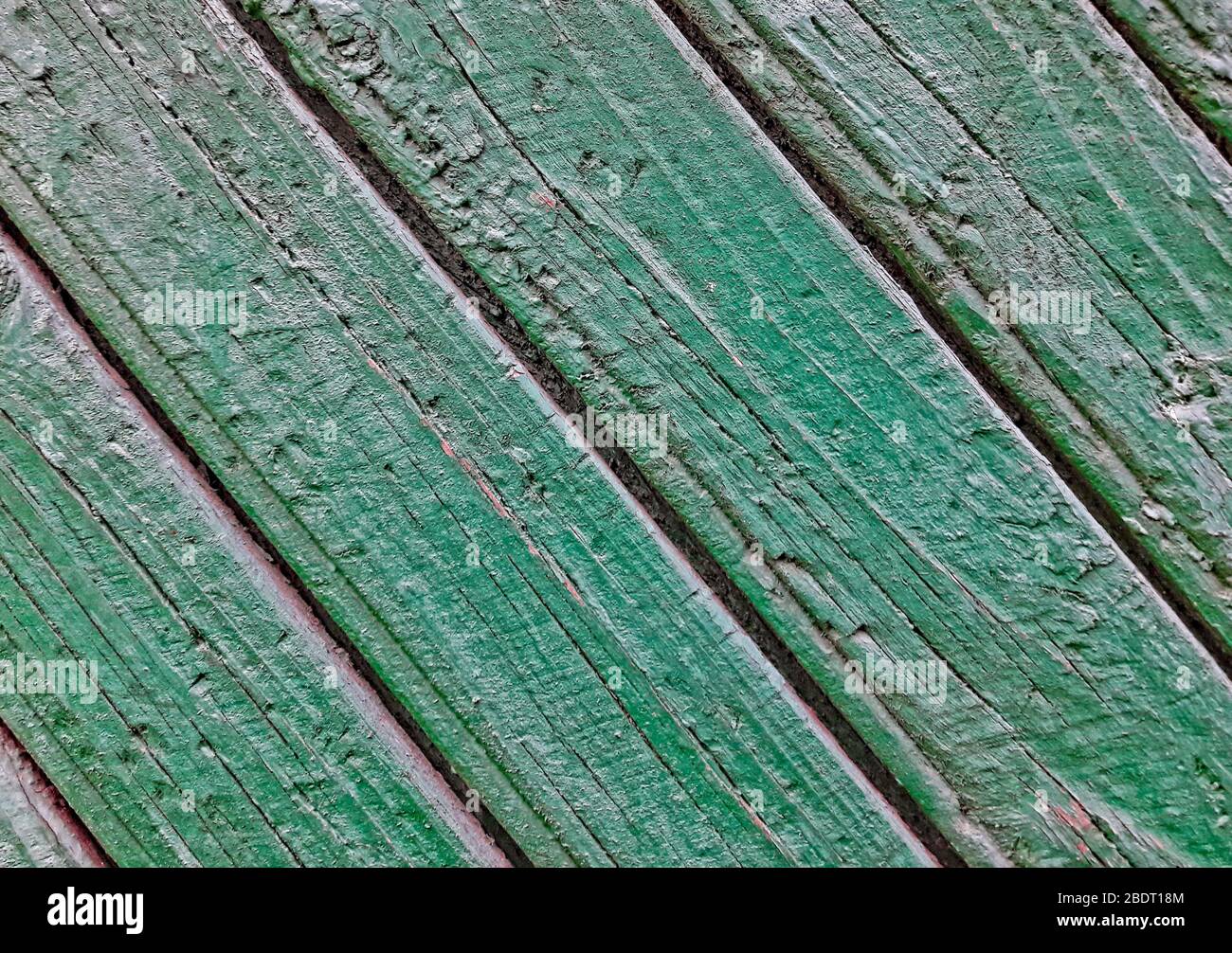 Hintergrund Texturen Wand Holz. Holzplanken grün. Stockfoto