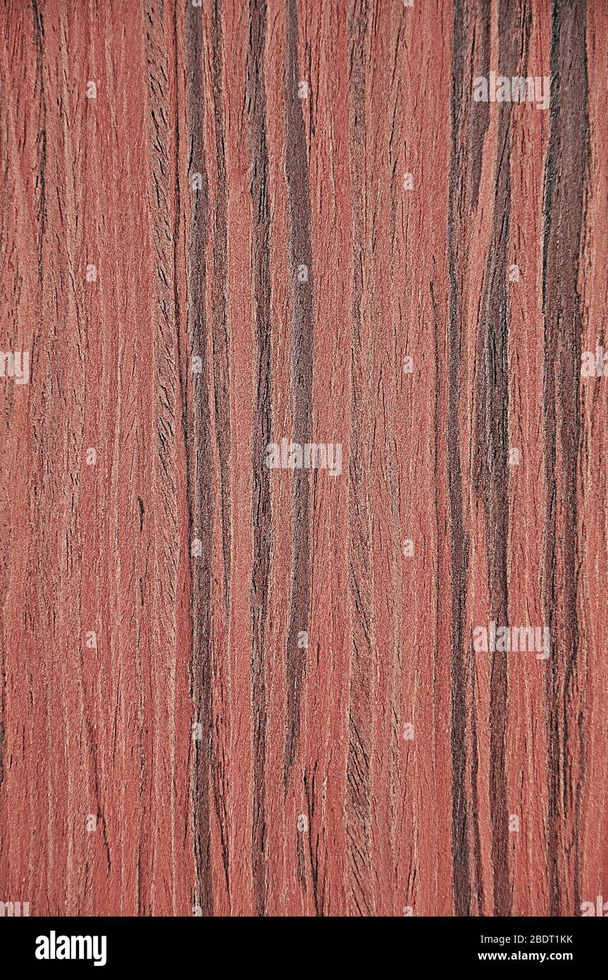 Holzstruktur. Rosa Hintergrund, mit schwarzen Streifen. Stockfoto