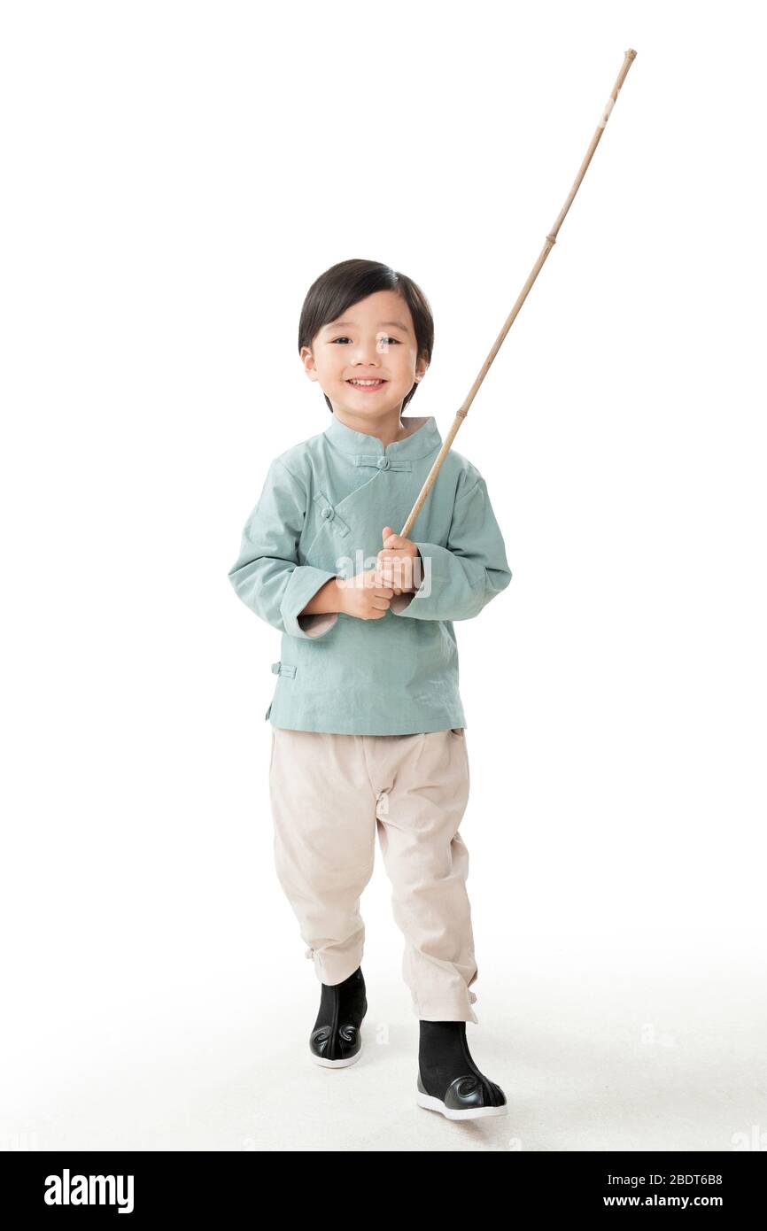 Ein kleiner Junge mit einer Laternenstange Stockfotografie - Alamy