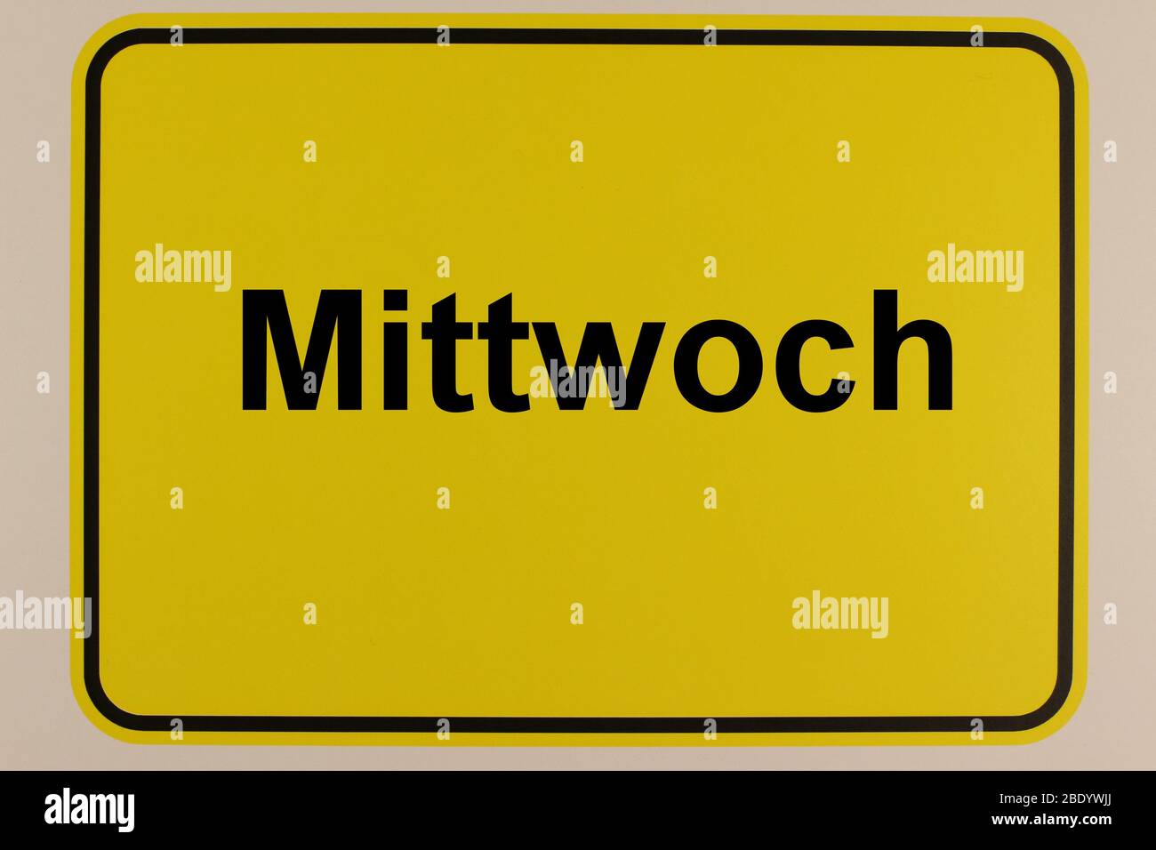 Illustration eines Stadtgangsschildes mit dem Schriftzug 'Mittwoch' Stockfoto